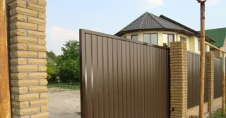 Купить откатные ворота из профнастила Качканар, цена от 1730 руб.